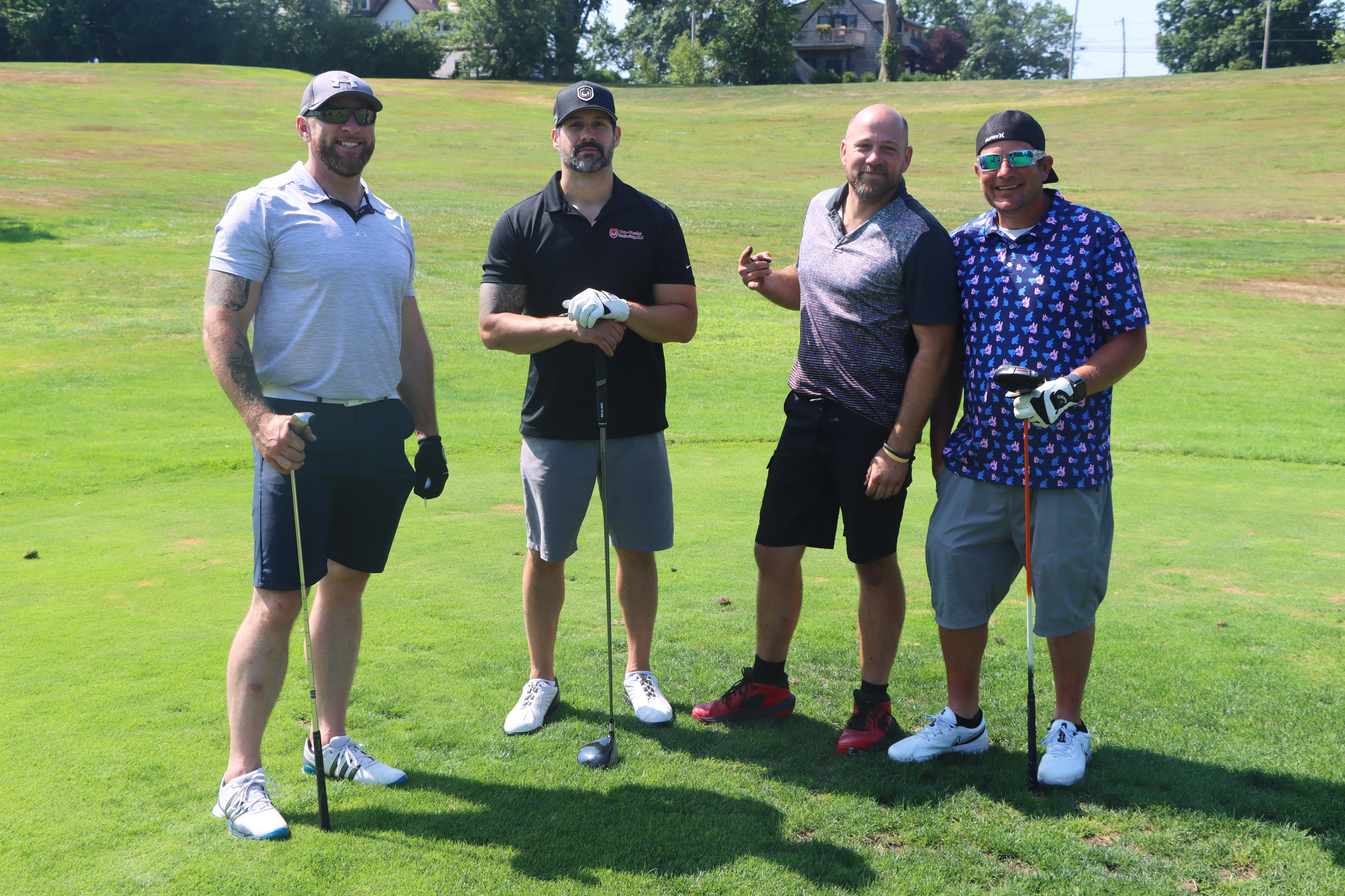 A group of golfers.