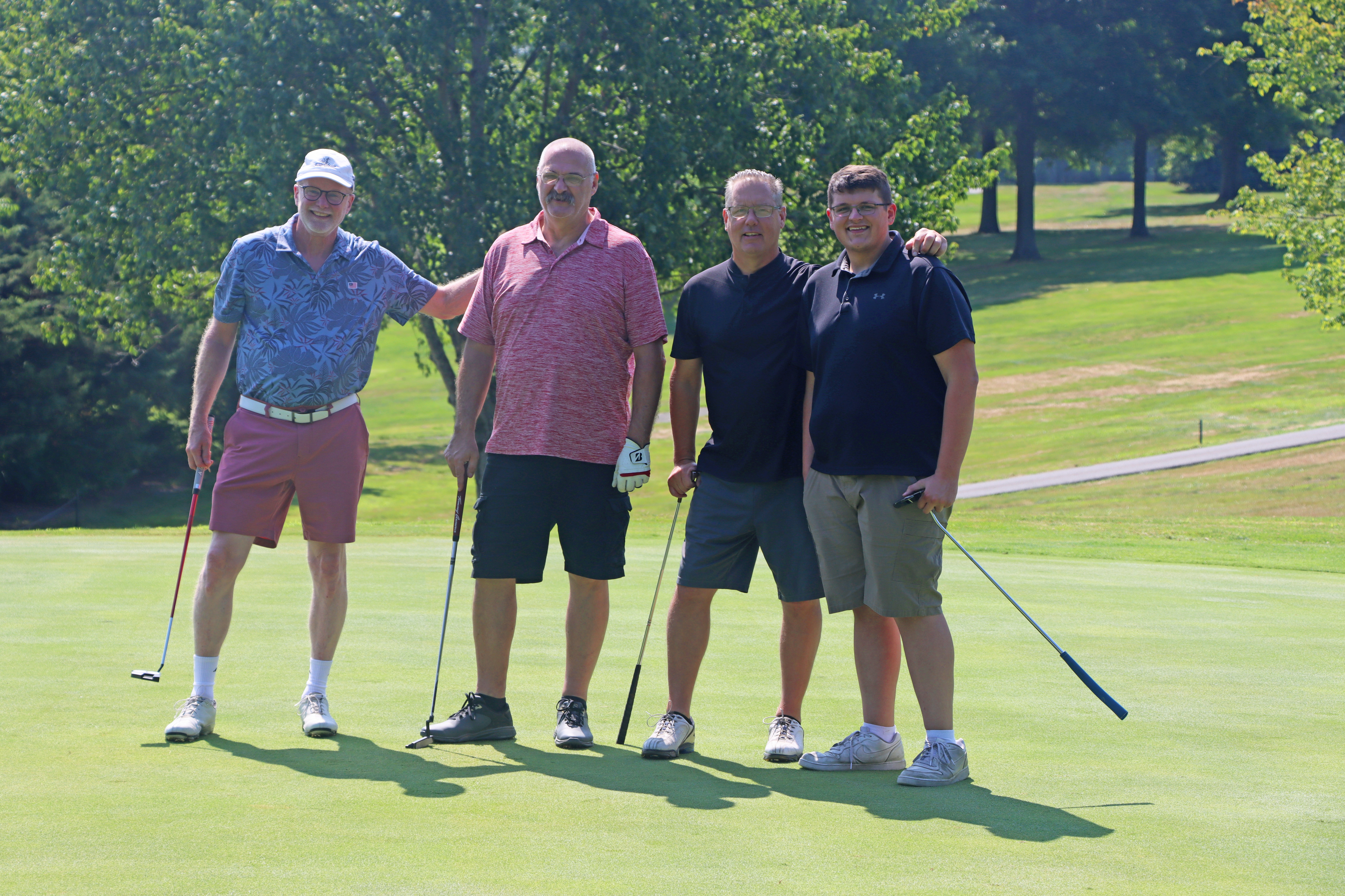 A group of golfers.