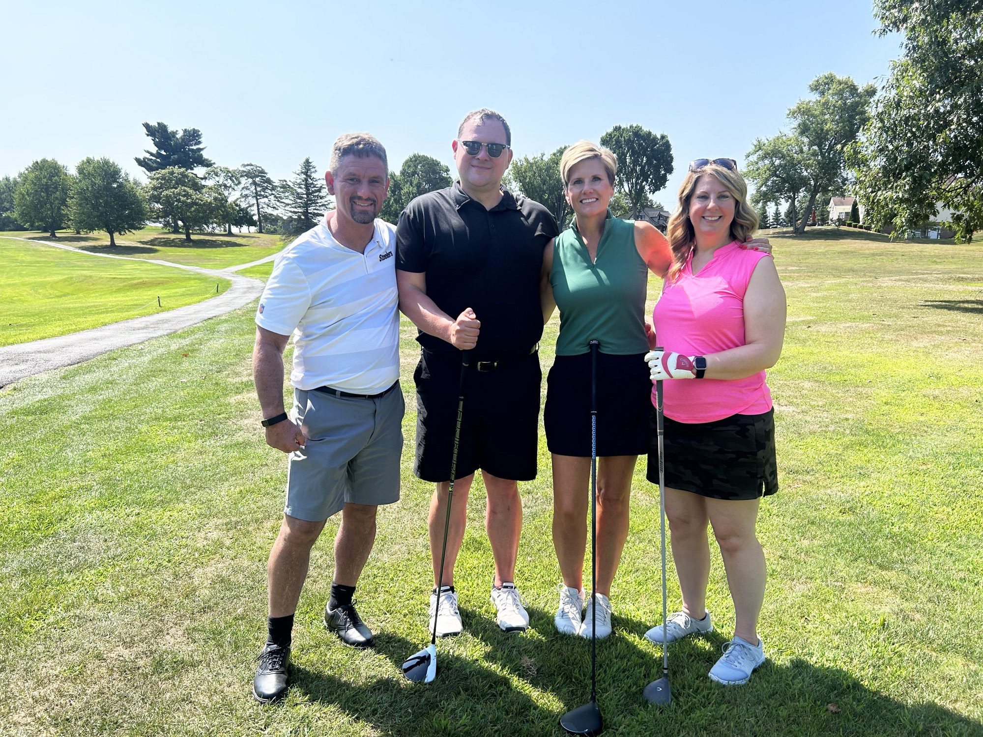 A group of golfers.