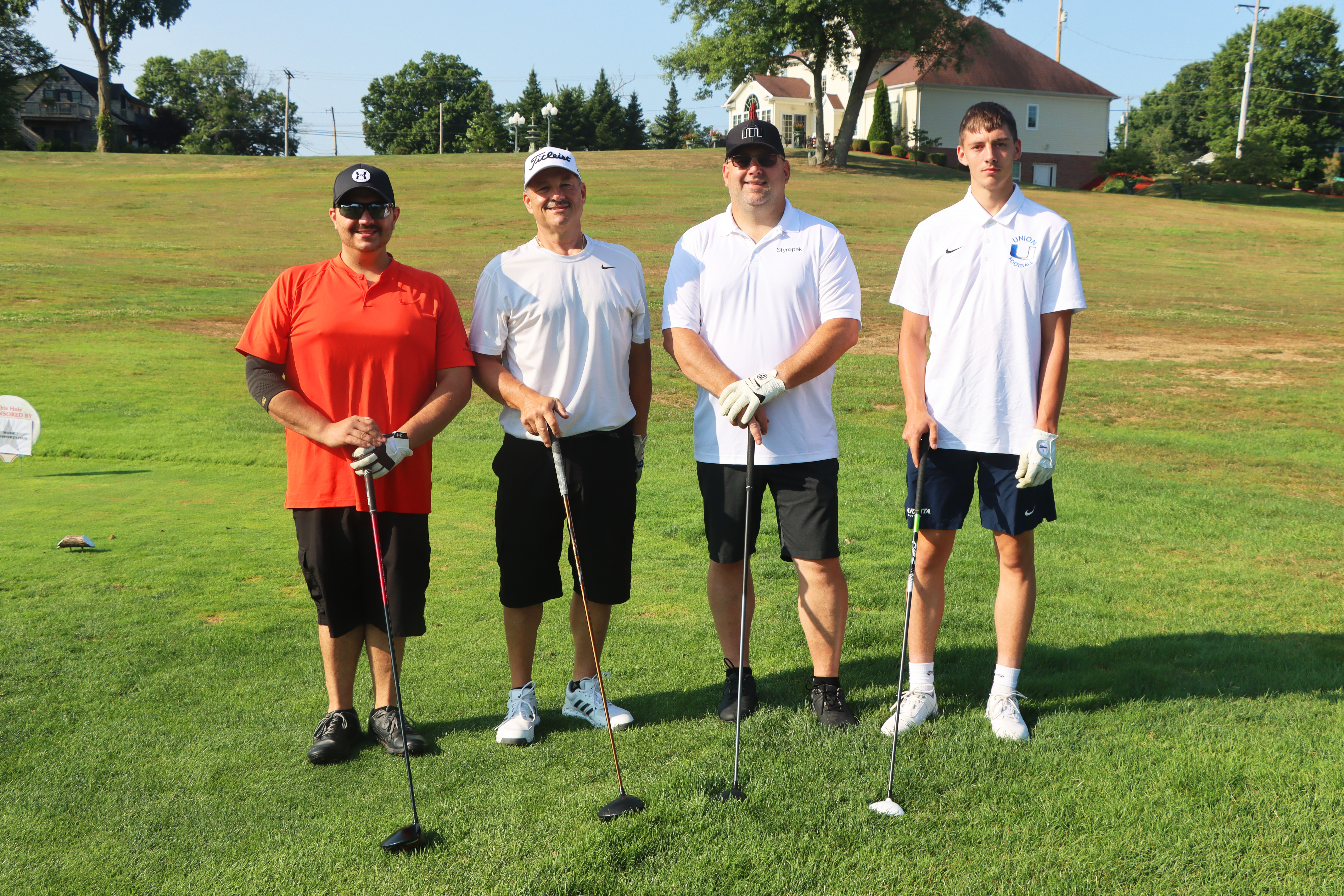 A group of golfers.