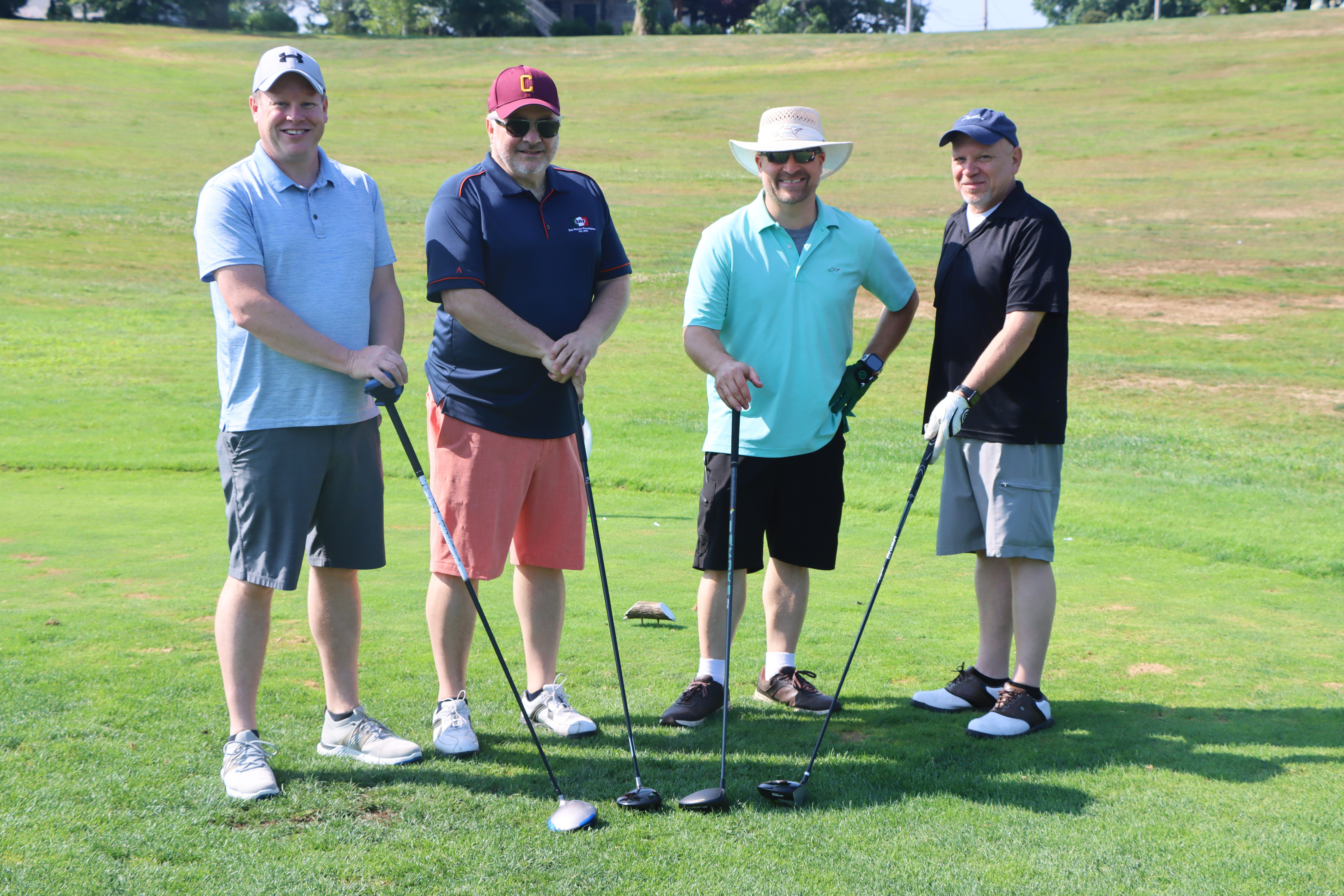 A group of golfers.