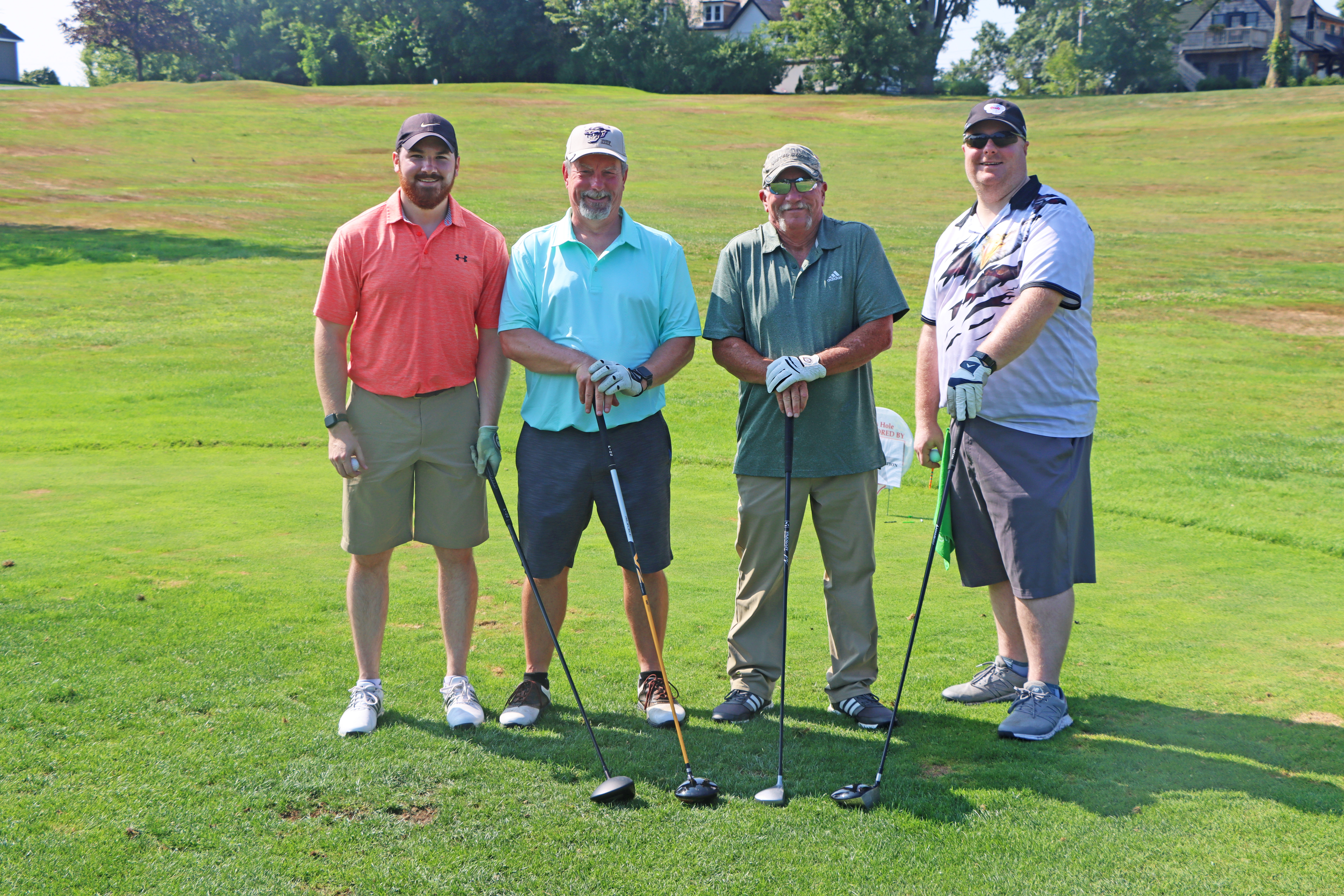 A group of golfers.