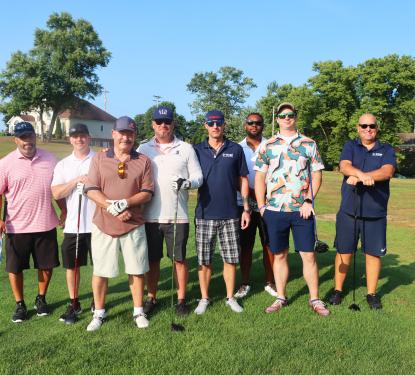 A group of golfers.